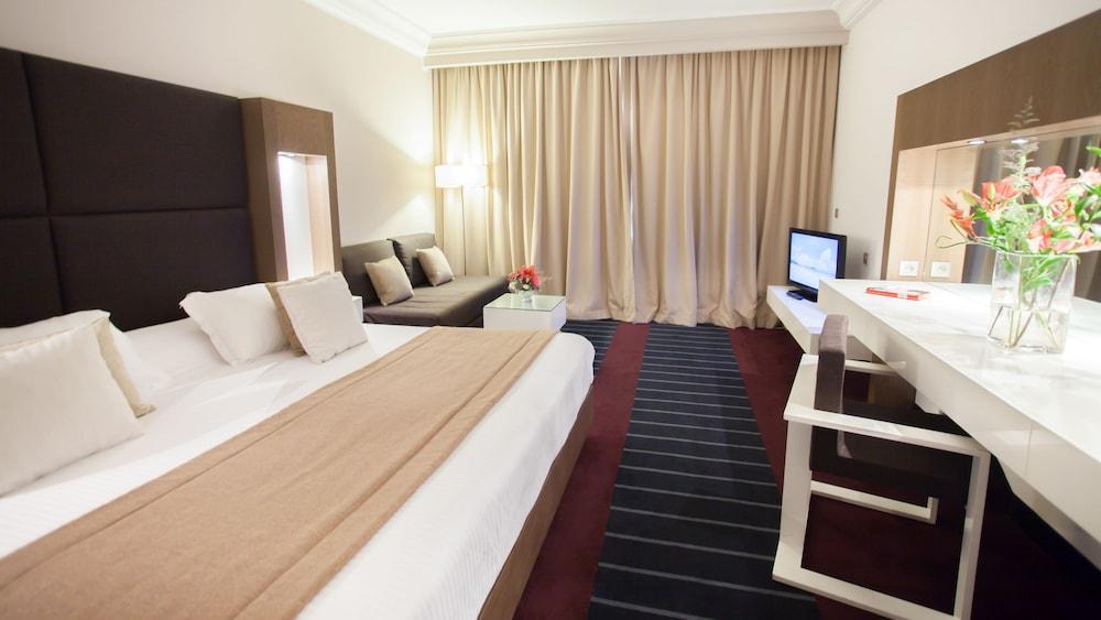 Hotel El Mouradi Gammarth Exterior foto A typical room at the hotel